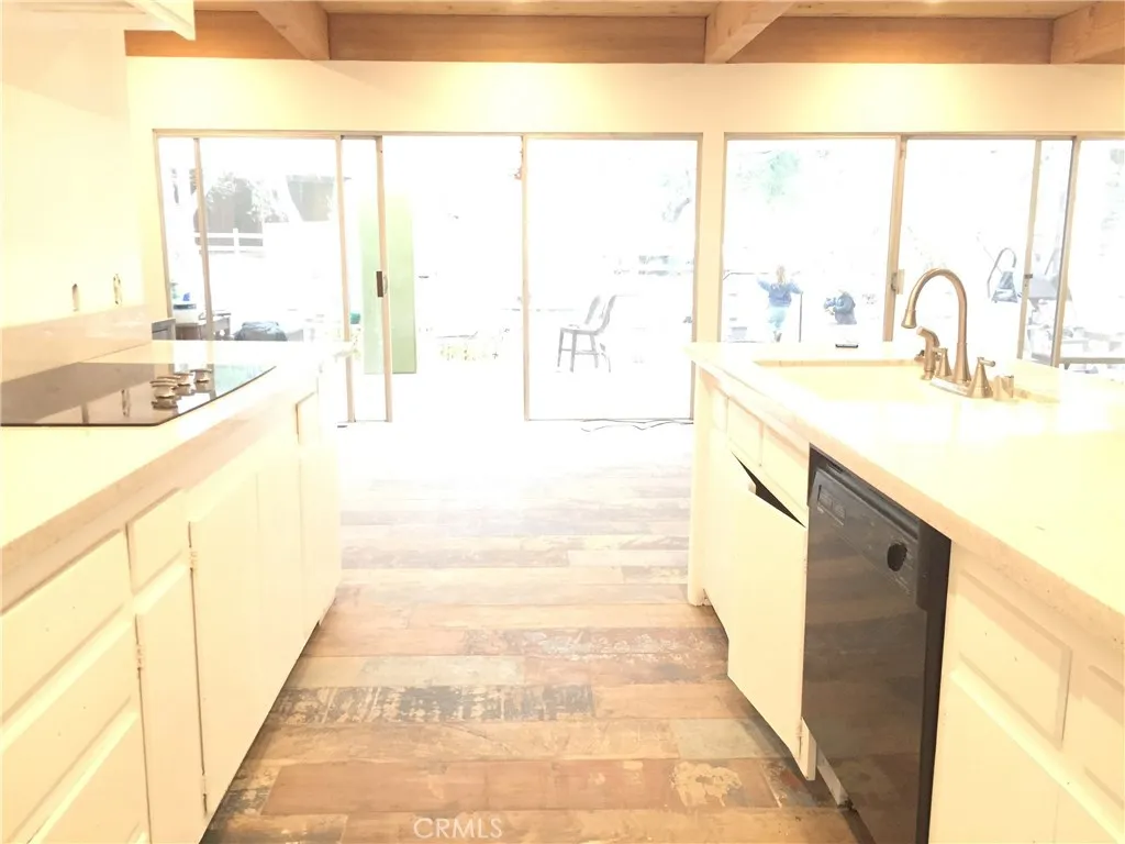 Living area opens to large back Porch/Deck and Backyard Ranch