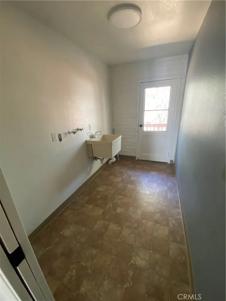 Laundry room has door to back yard. Laundry room has door to back yard.