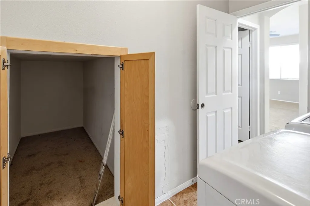 Large storage area in laundry room Large storage area in laundry room