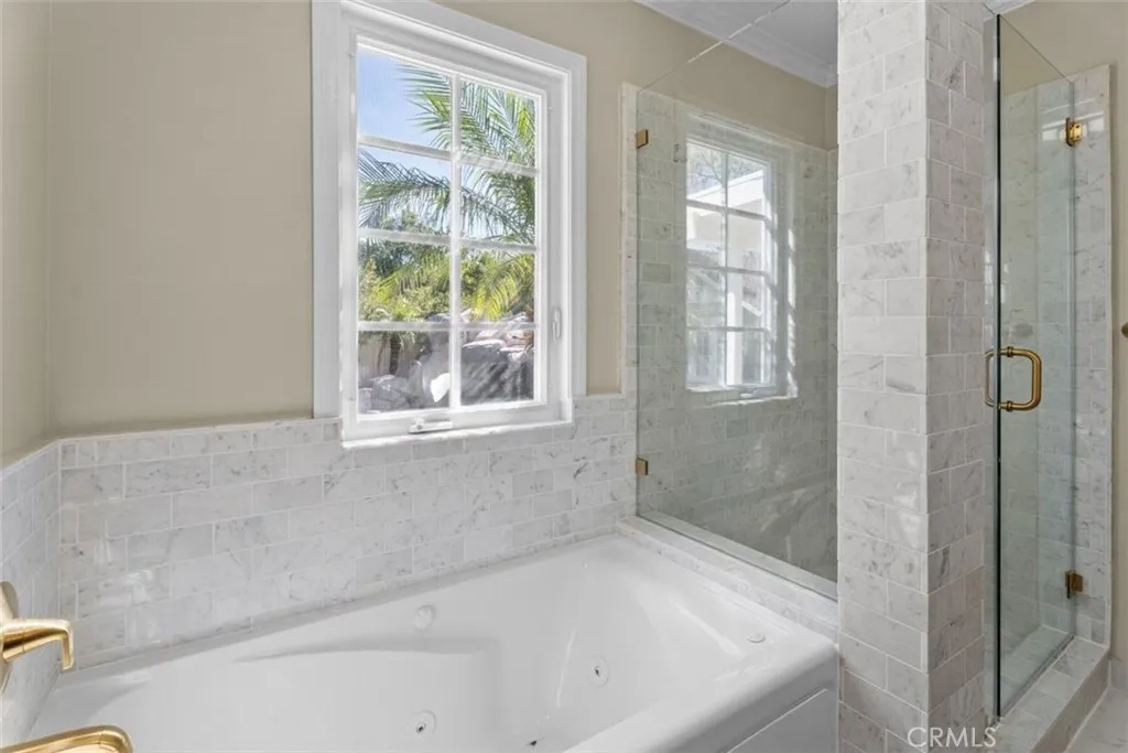 Primary Bathroom with separate shower and  spa tub