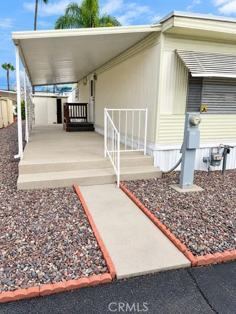 Main entrance with covered patio Main entrance with covered patio