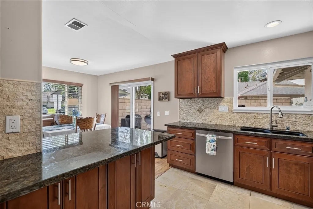 Kitchen is 12' 9"  X  9' 0"