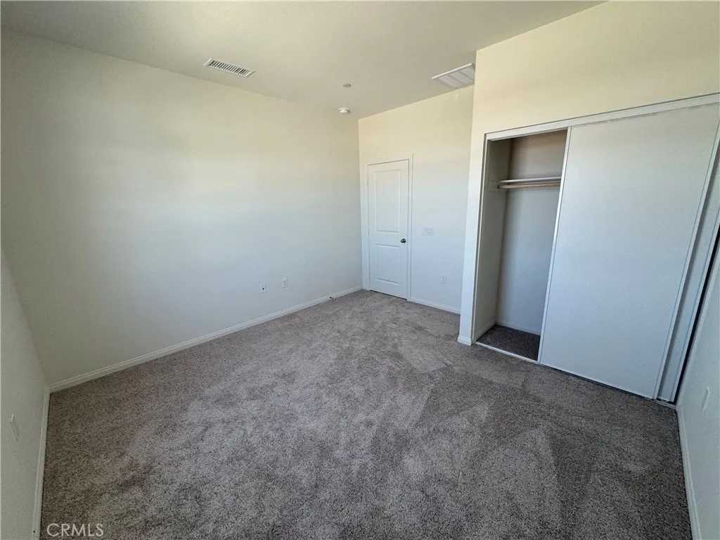 view bedroom with window on sea ace line adjacent to independent bathroom