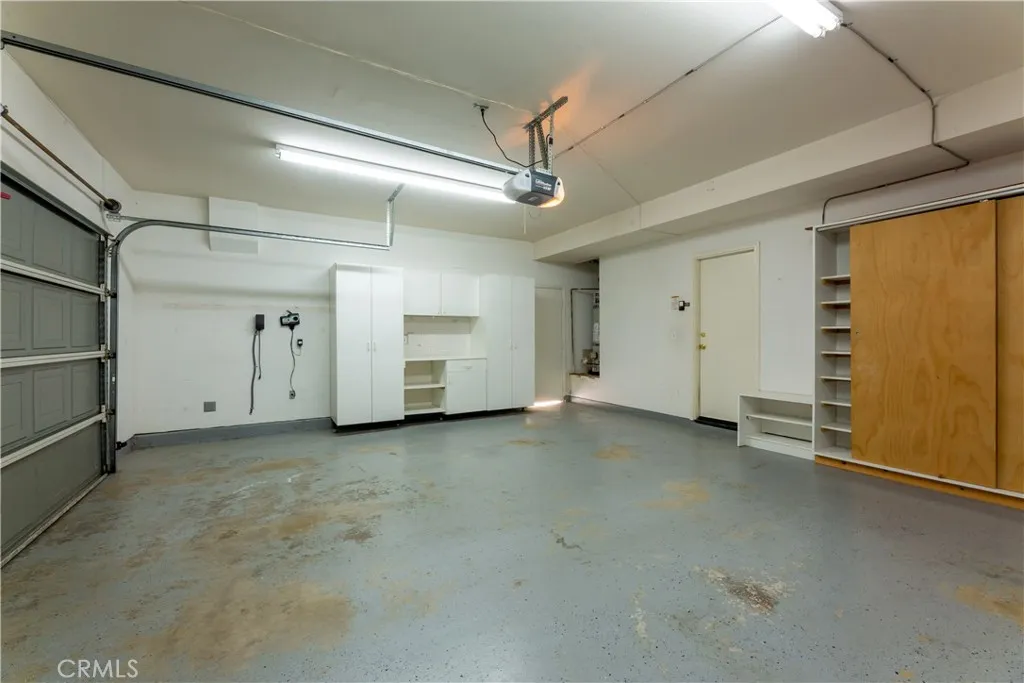 Garage includes cabinet for storage Garage includes cabinet for storage