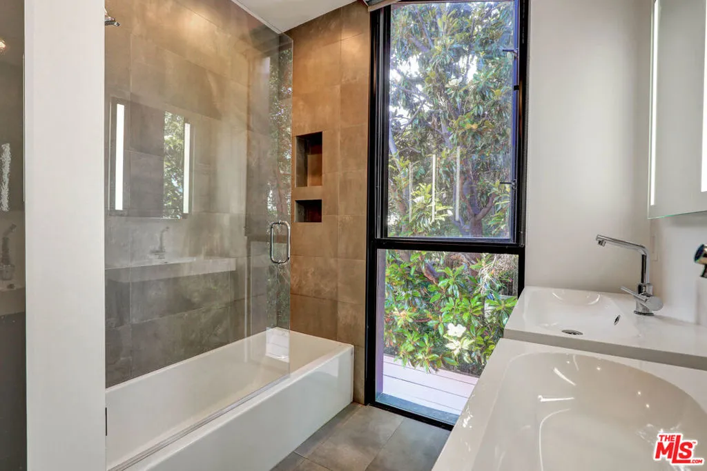 Spa-like primary bath with gla Spa-like primary bath with gla