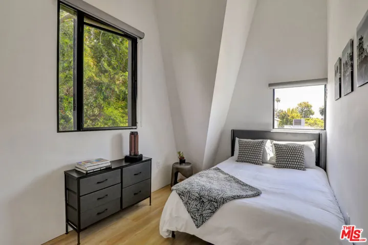 Cozy guest bedroom with angled