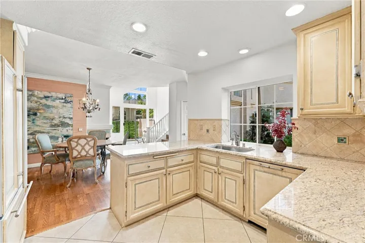 A welcoming kitchen, open to Dining area and Living room area
