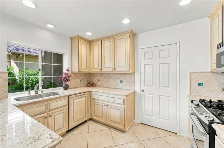 Beautiful Kitchen, convenient access to laundry room, and direct garage access