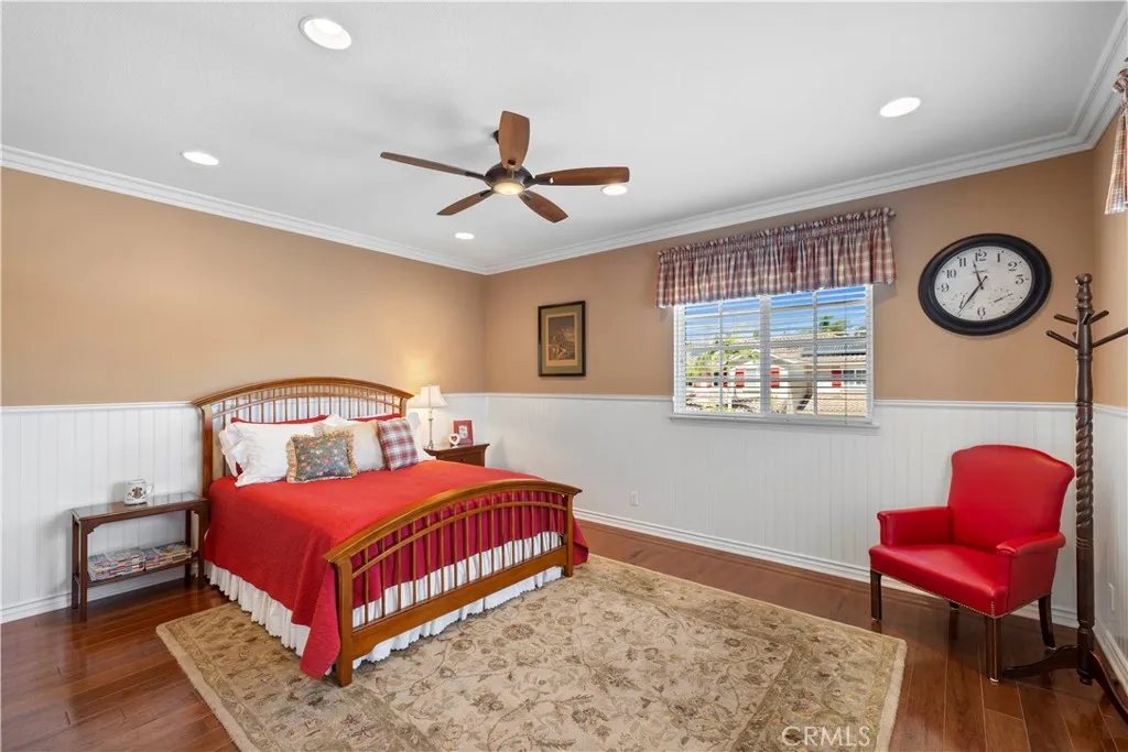 Gorgeous Bedroom with Stunning Wainscoting, Crown Molding and Custom Built-In's. Gorgeous Bedroom with Stunning Wainscoting, Crown Molding and Custom Built-In's.