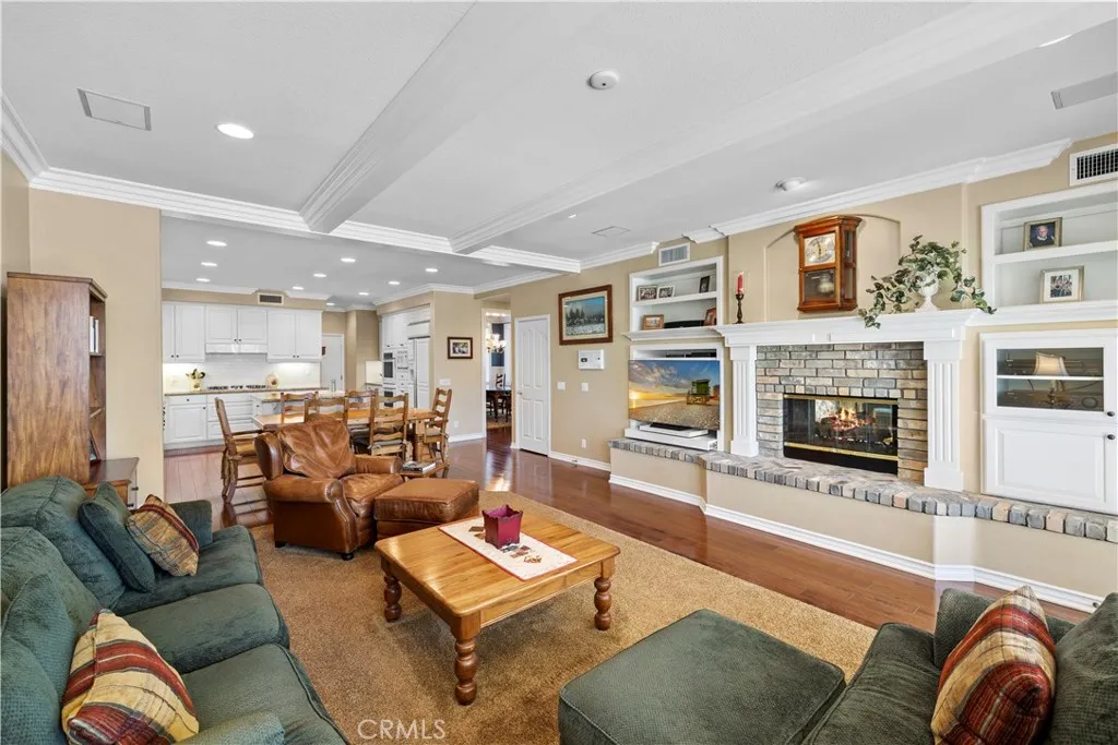 Gorgeous Kitchen with "Walk-In Pantry" opens to the Spacious Family Room with Beautiful Custom Built-In's. Gorgeous Kitchen with "Walk-In Pantry" opens to the Spacious Family Room with Beautiful Custom Built-In's.