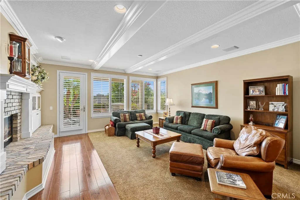 Gorgeous Beamed Ceilings in the Family Room with a 2 way Fireplace (that Shares with Living Room). Gorgeous Beamed Ceilings in the Family Room with a 2 way Fireplace (that Shares with Living Room).