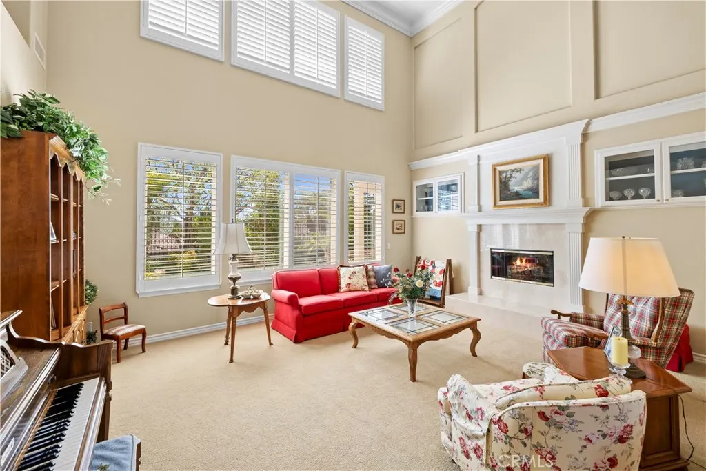 Stunning Formal Living Room with 2 way Gas Fireplace for your Enjoyment. Stunning Formal Living Room with 2 way Gas Fireplace for your Enjoyment.