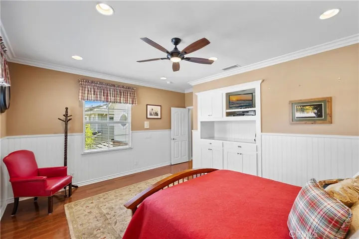 Stunning Built-In's with Wainscoting and Beautiful Ceiling Fan.