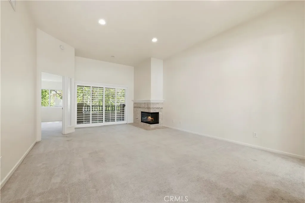 Spacious living room with fireplace. Spacious living room with fireplace.