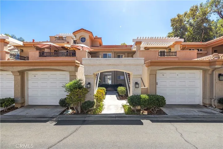 Garage and entrance to upper unit.