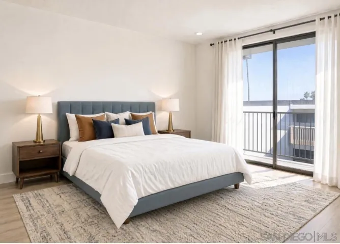 Secondary bedroom with king bed Sliding door to balcony