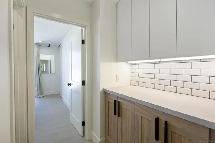 storage cabinets outside bedroom