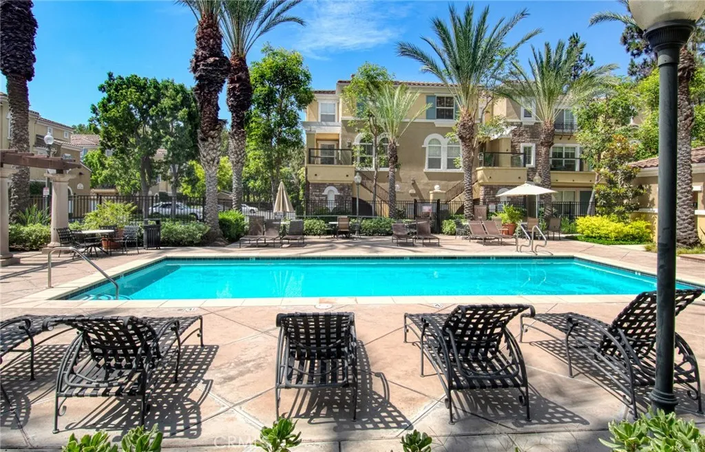 Pool located off entrance to building.