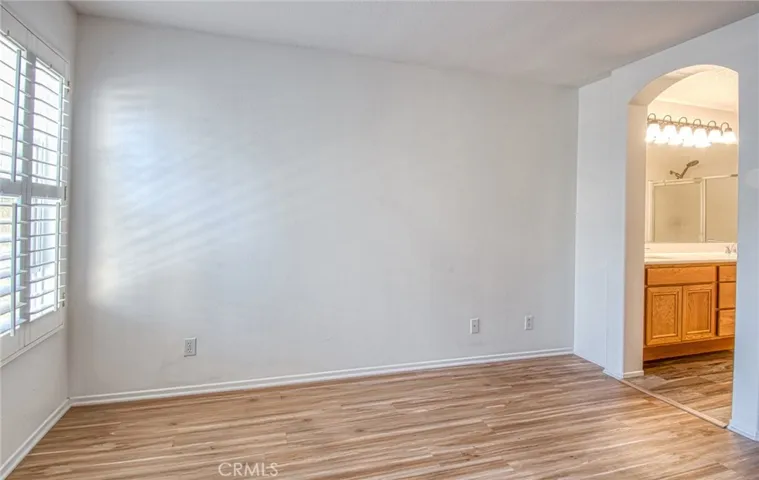 Primary bedroom opens to primary bathroom.