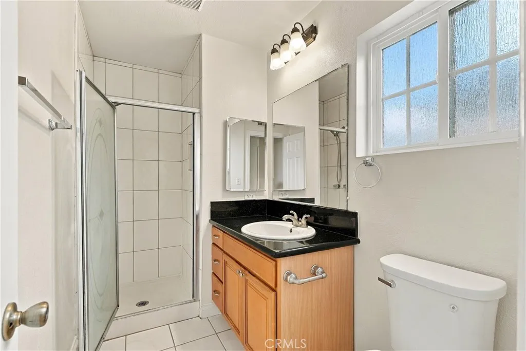 Downstairs hallway bathroom with walk-in shower Downstairs hallway bathroom with walk-in shower