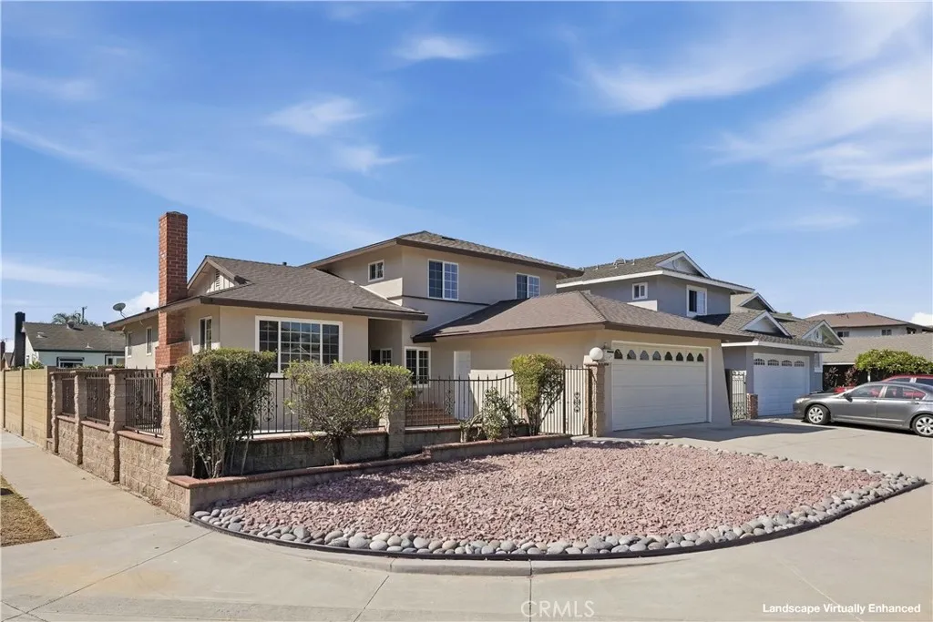 Front of the home - yard has been virtually enhanced. Front of the home - yard has been virtually enhanced.