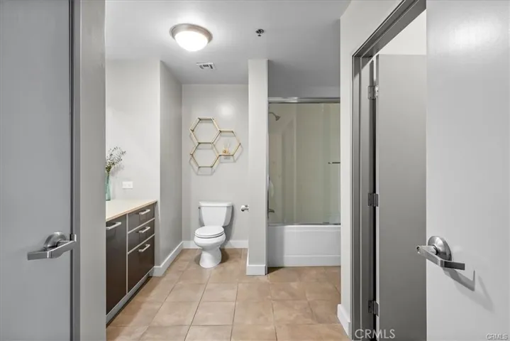 Primary Bathroom (door to the right is the walk-in closet and door to the left is the laundry)
