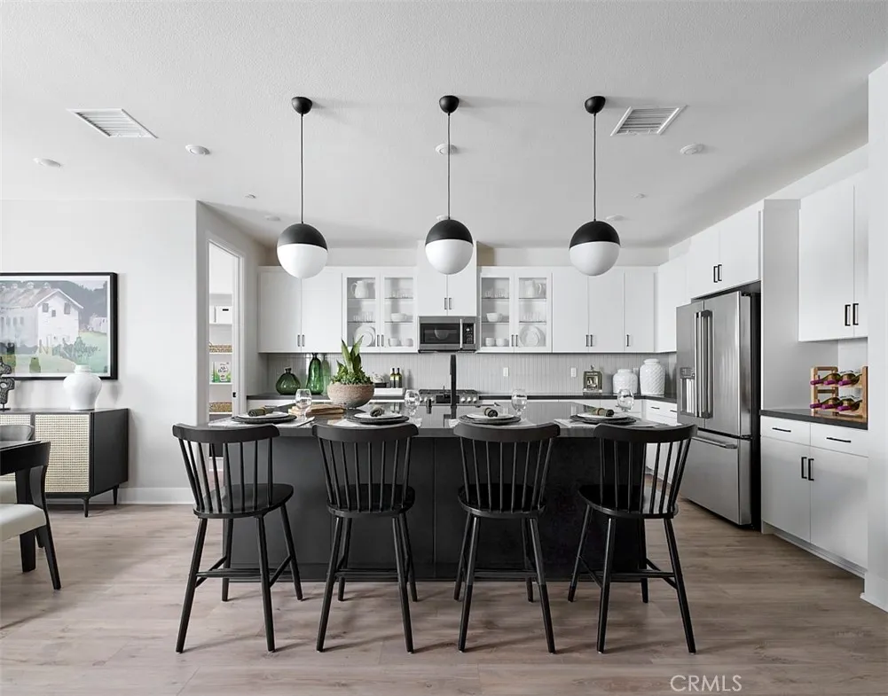 Model Photo-Actual home finishes and materials may vary. Model Photo-Actual home finishes and materials may vary.