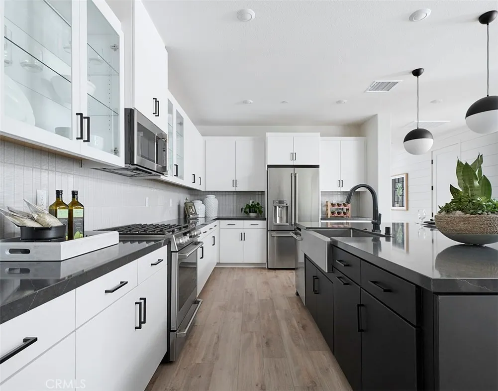 Model Photo-Actual home finishes and materials may vary. Model Photo-Actual home finishes and materials may vary.