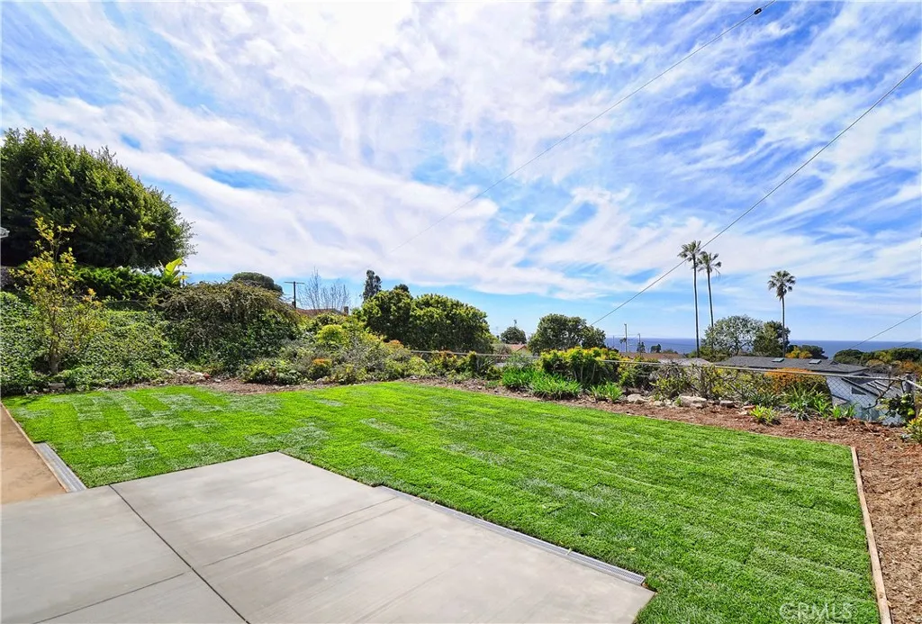 Great wide angle views of ocean and coastline from patio and large newly sodded back yard Great wide angle views of ocean and coastline from patio and large newly sodded back yard