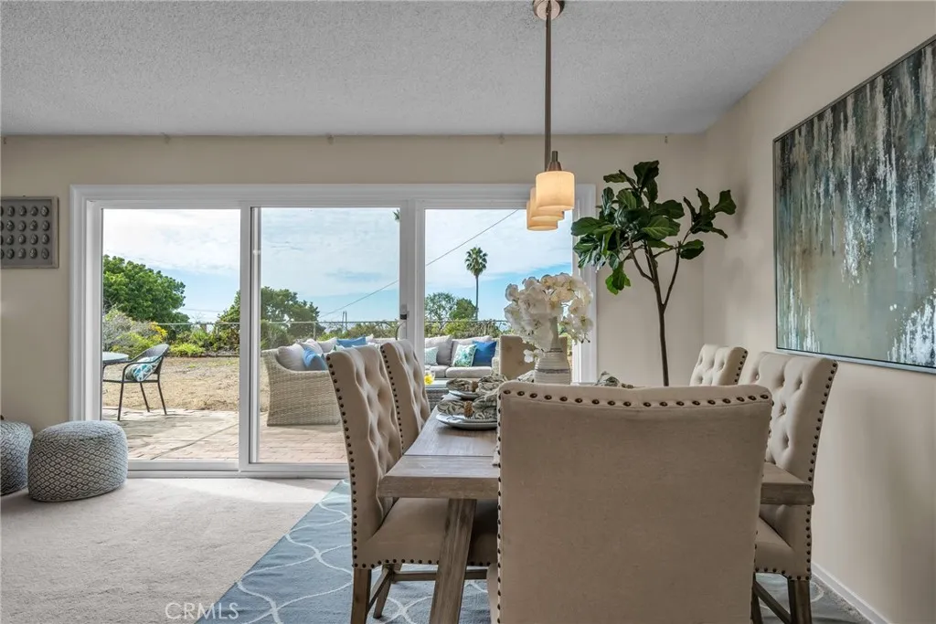 Dining area with easy access to rear yard Dining area with easy access to rear yard