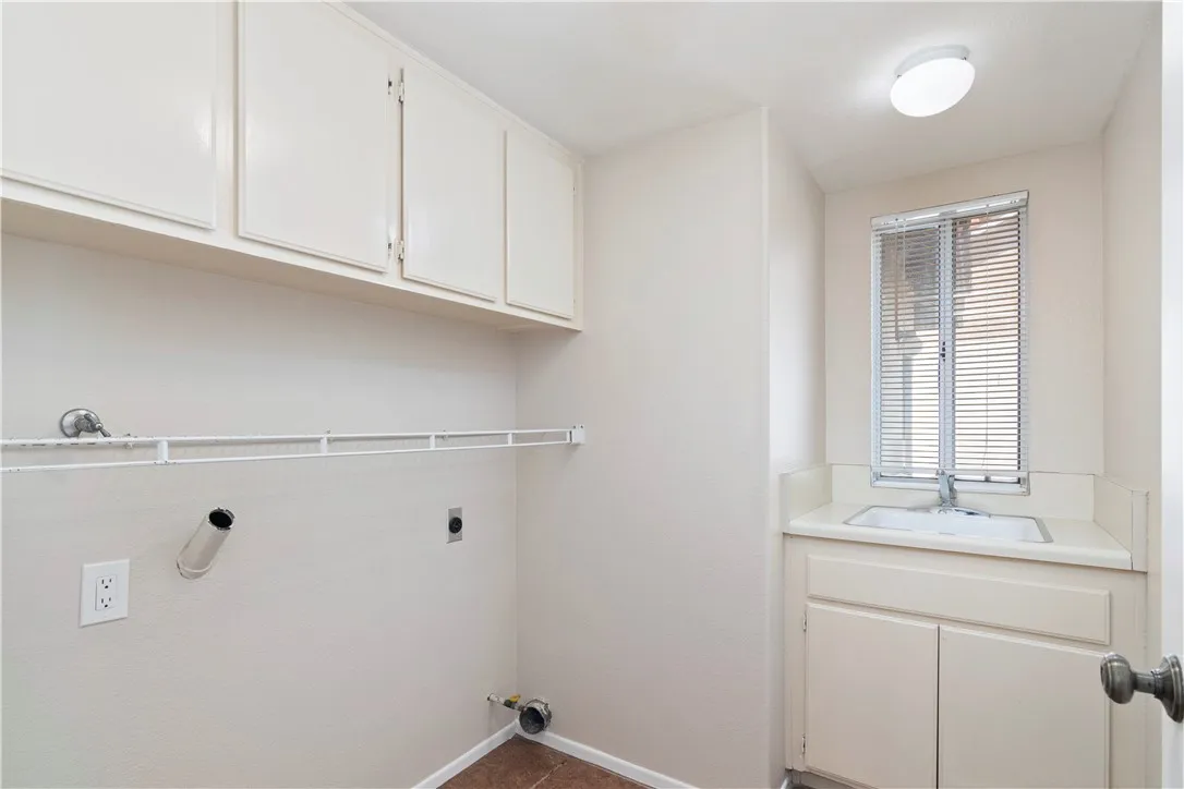 Interior laundry room with utility sink Interior laundry room with utility sink