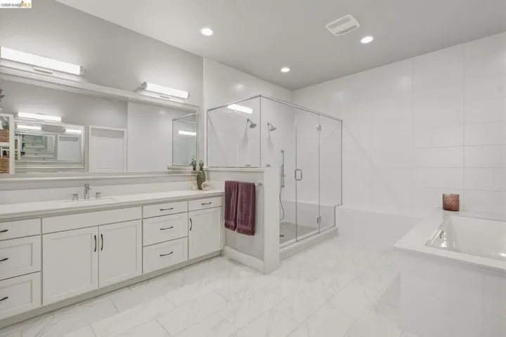 Dual vanity with undermount sink and stone countertop