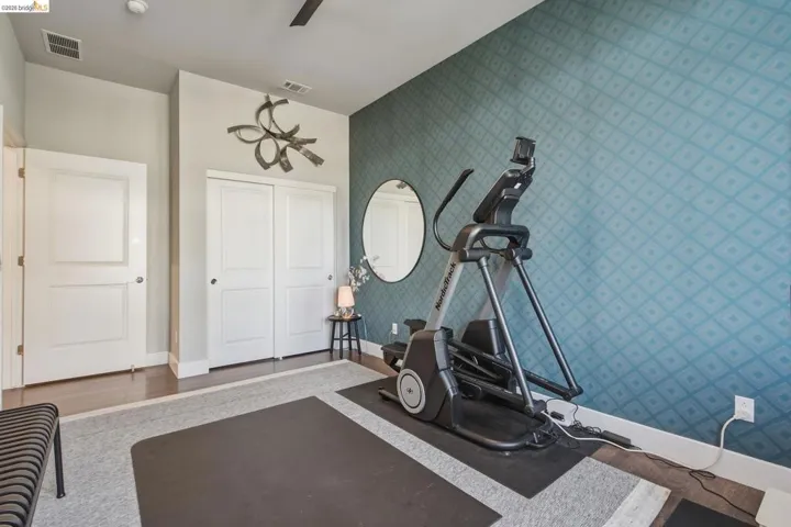 Accent wall featuring patterned wallpaper