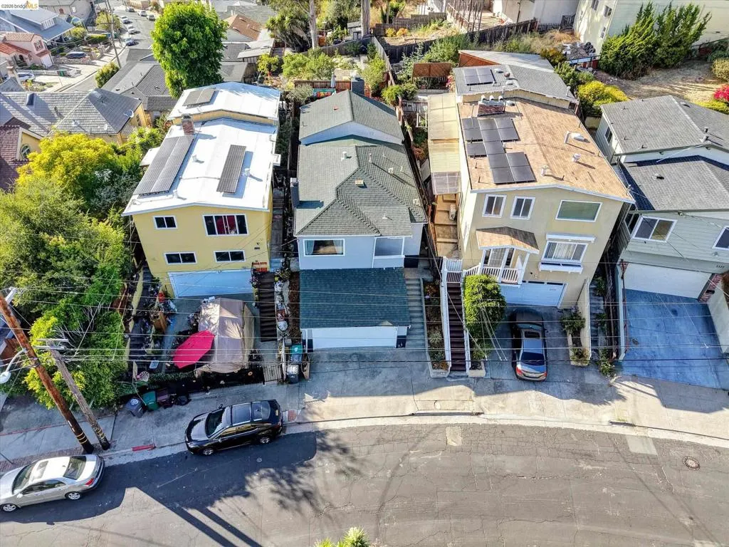 Multiple properties featuring solar panel installations, multi-level construction, and integrated garages