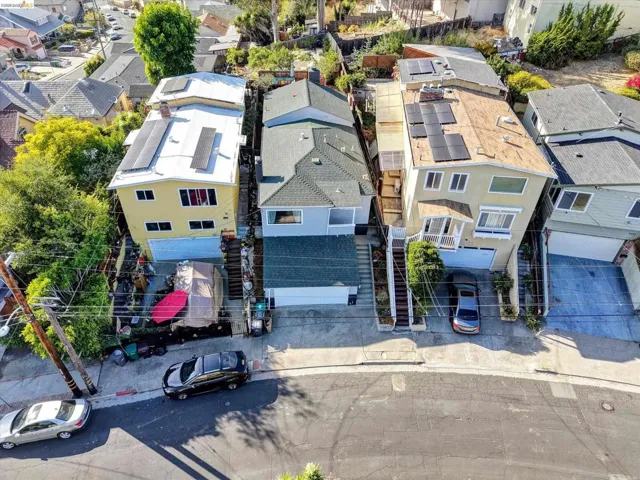 Multiple properties featuring solar panel installations, multi-level construction, and integrated garages