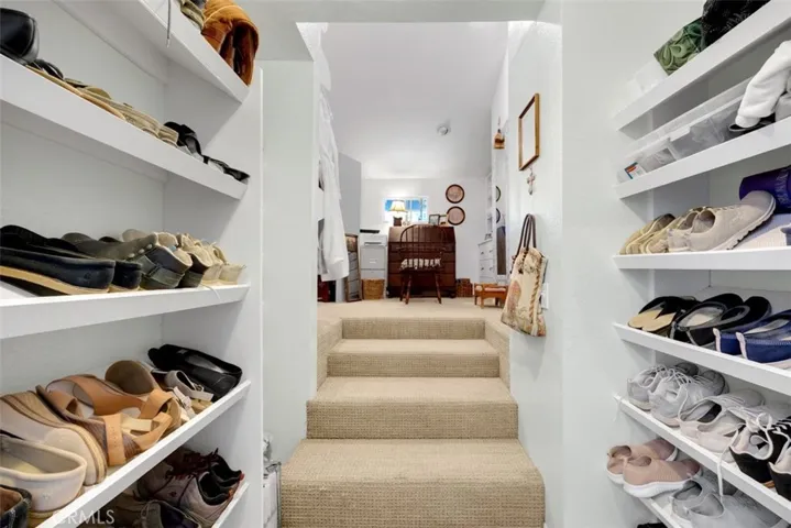 Lovely walk in closet in primary