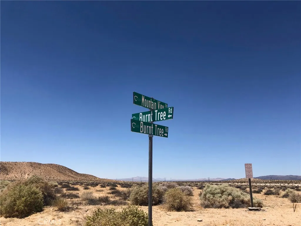 You can turn here and go west to American Way then go north to the lot. You can turn here and go west to American Way then go north to the lot.