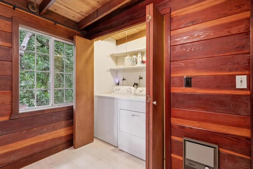 Full size washer/dryer closet located in Primary bathroom Full size washer/dryer closet located in Primary bathroom