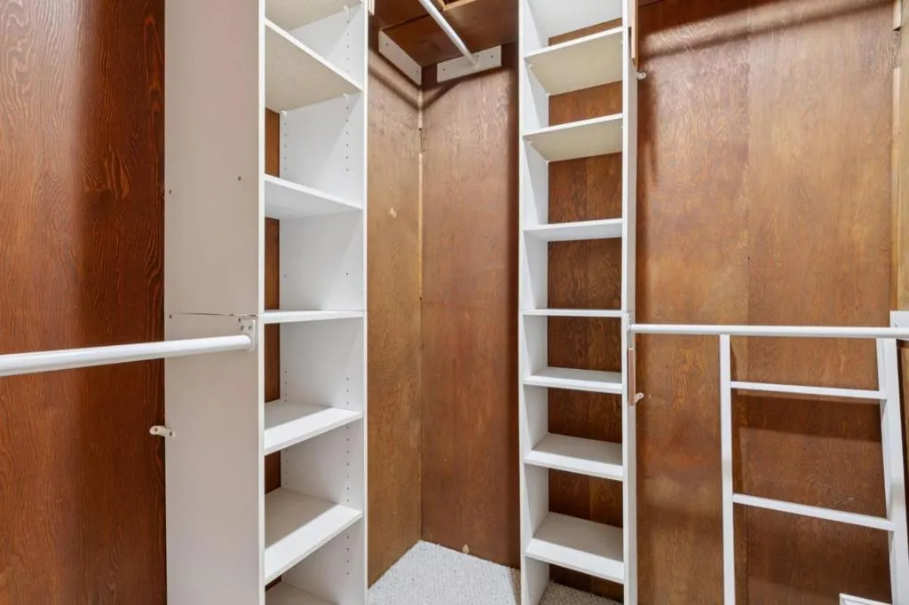 Organizing shelves in walk-in closet Organizing shelves in walk-in closet