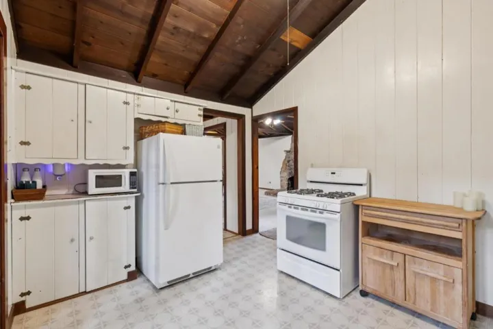 Gas Range, Refrigerator, and Microwave included in sale.