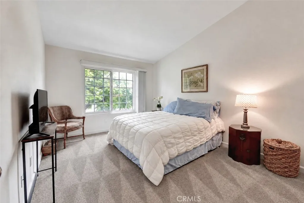 Spacious bedroom with high ceiling