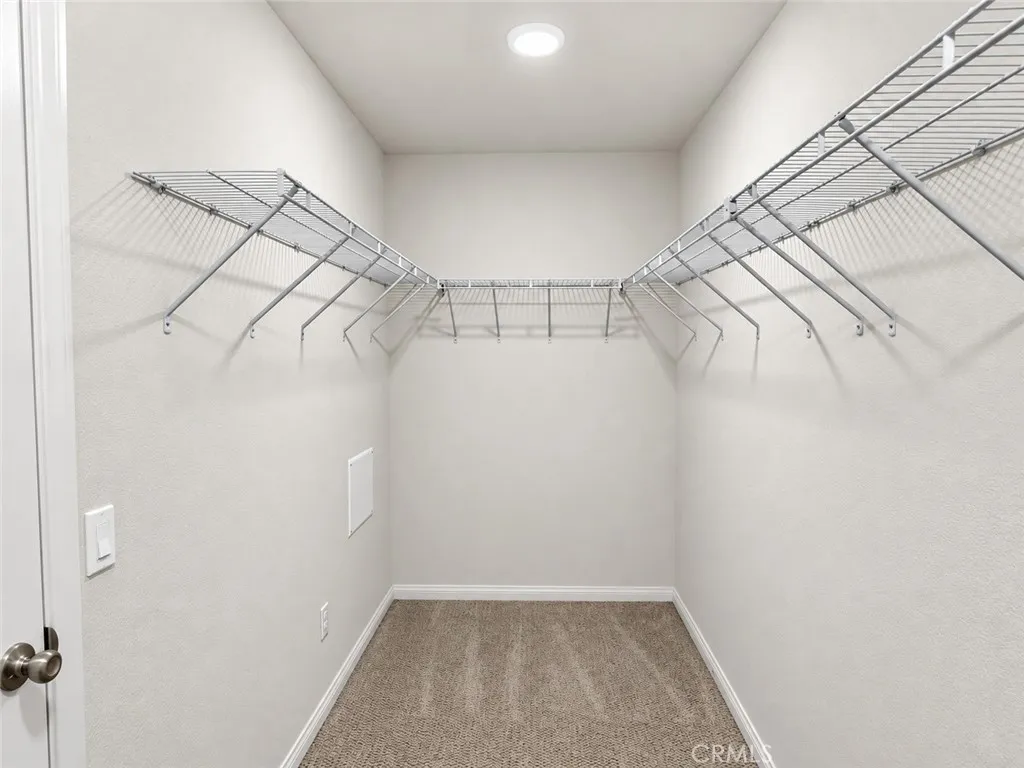 Primary Suite Walk-In Closet