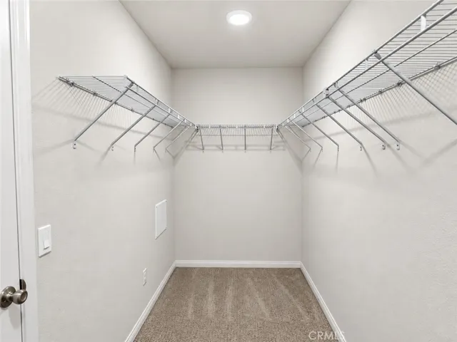 Primary Suite Walk-In Closet