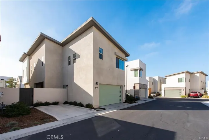 2 Car Garage + Additional Private Parking Space attached