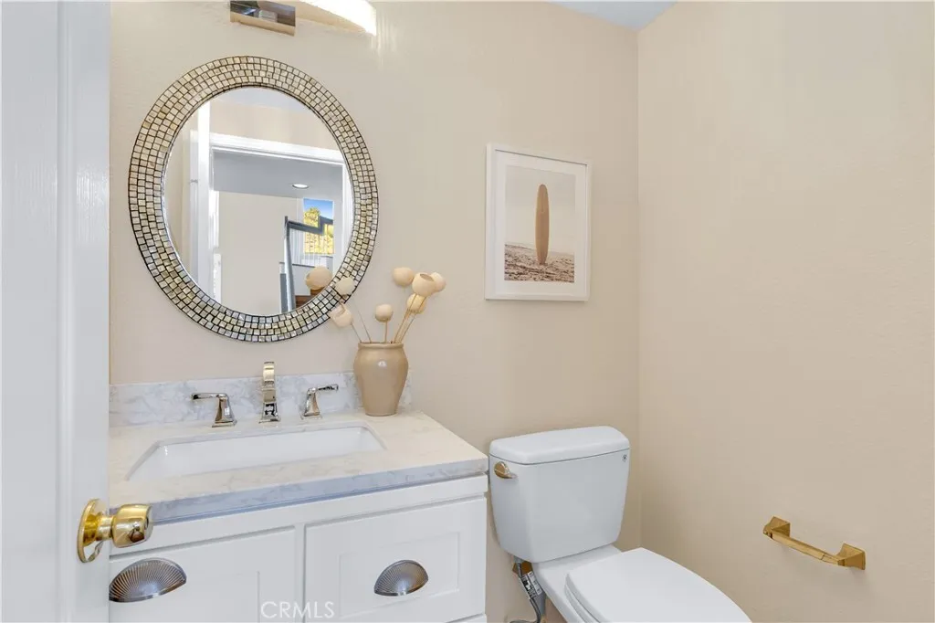 The downstairs half bathroom also has an upgraded vanity area.