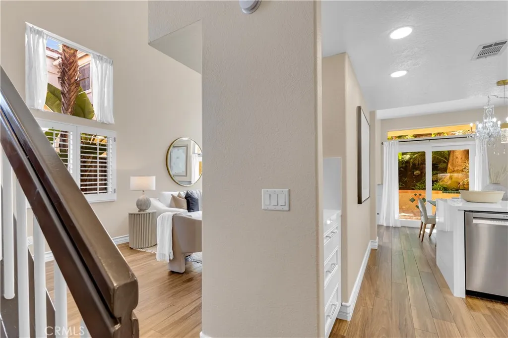 There is also a mini coffee bar area in the kitchen with custom cabinets, a microwave and storage space for either coffee, wine, etc.