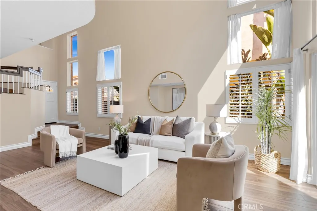 The living room has vaulted ceilings approximately 20 feet high.
