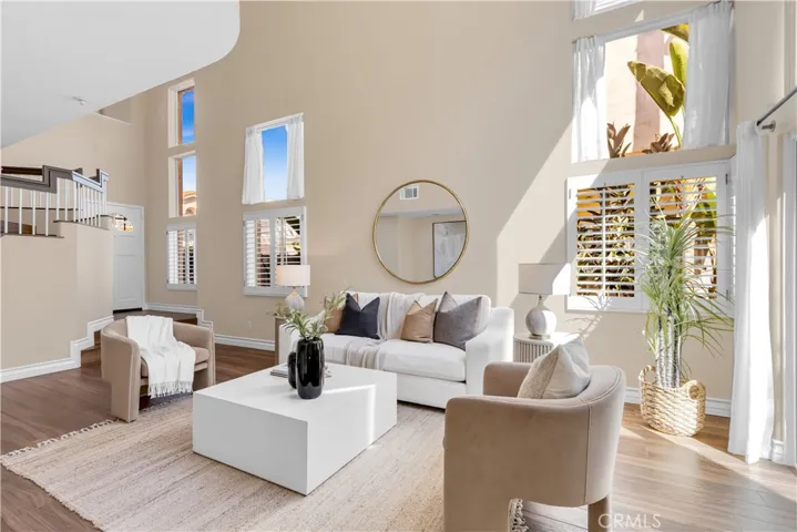 The living room has vaulted ceilings approximately 20 feet high.
