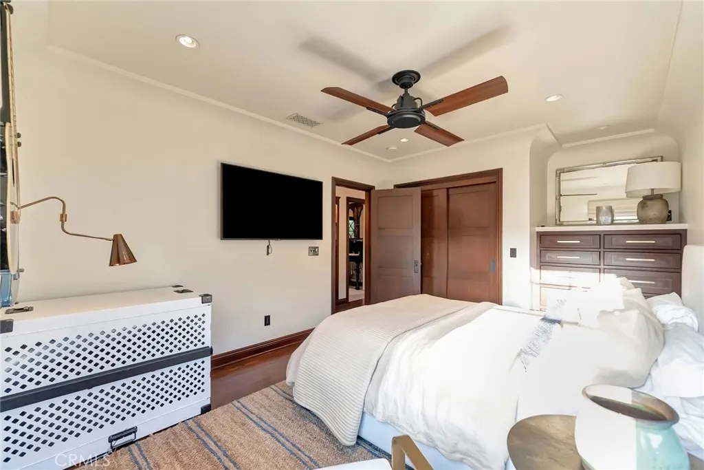 2nd floor Secondary bedroom #2 is spacious, incredible built-ins and solid mahogany doors are throughout the home, adorned with solid brass hardware.