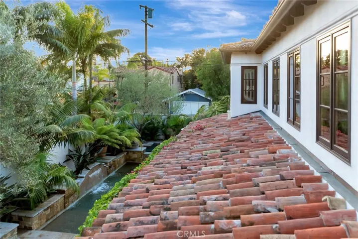 Reclaimed Tuscany tile crowns this home, hand-set to perfection, intended to look authentic and to age beautifully, with the state of the art moisture barrier system is present under the tile.